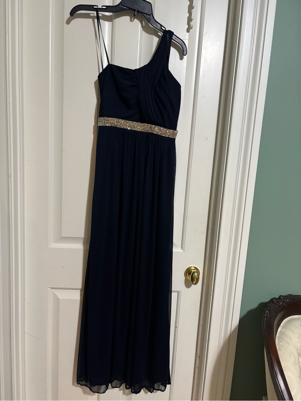 Blondie Nites 7 . Elegant One-Shoulder Black Evening Dress with Gold Band.